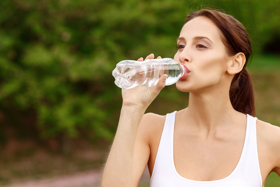 bigstock Pretty girl drinking water in 91959632