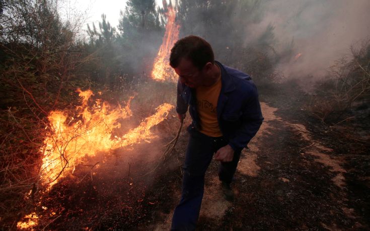 2016-08-11T163830Z_1359648648_S1BETUVXDUAA_RTRMADP_3_SPAIN-WILDFIRE.jpg