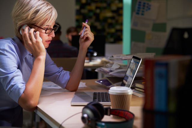bigstock Female Office Worker With Coff 98584286