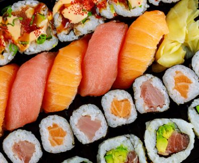 Healthy fresh sushi roll set with ginger close up. Japanese food. Top view.