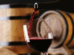 bigstock-Pouring-red-wine-from-bottle-i-90032456