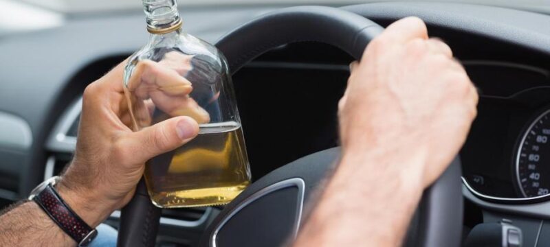 whiskey-in-hand-while-driving