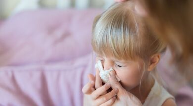 bigstock-Child-With-Runny-Nose-Mother-232161700
