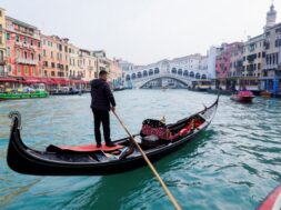 A gondola is pictured on Grand Canal in front of Rialto bridge in Venice