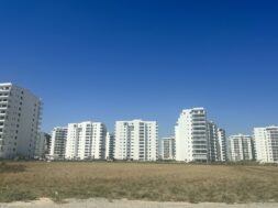feature-tom-main-The-plains-of-Trikimo-are-coated-with-high-rises-but-the-infrastructure-is-not-in-place-to-support-them