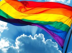 pride-flag-blue-sky-768×514