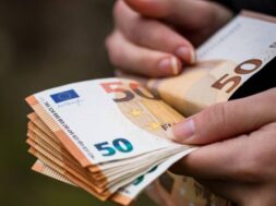 a30c206f-closeup-female-hands-counting-euro-banknotes-world-money-inflation-economy-concept