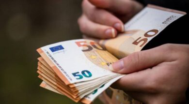 a30c206f-closeup-female-hands-counting-euro-banknotes-world-money-inflation-economy-concept