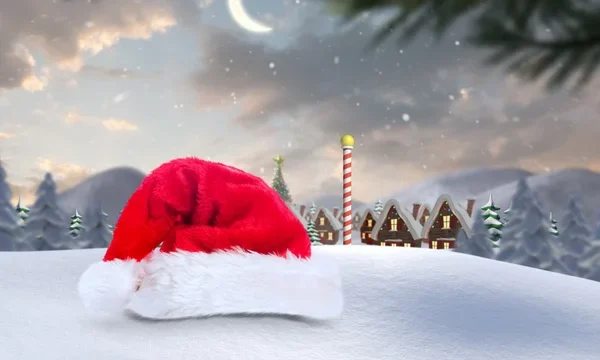 depositphotos_62489291-stock-photo-compsanta-hat-on-snow