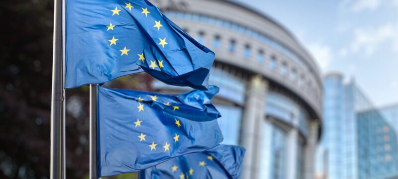European,Union,Flag,Against,Parliament,In,Brussels,,Belgium