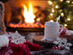Christmas cozy hot chocolate in front of the fireplace