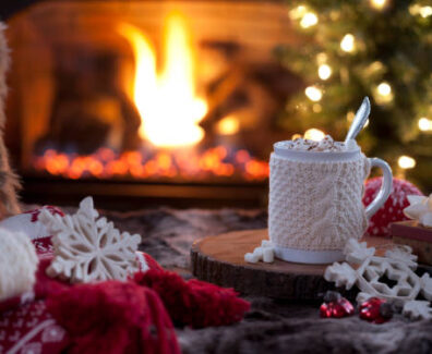 Christmas cozy hot chocolate in front of the fireplace