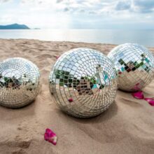 disco-ball-sand-view-from-beach-party_397170-1660