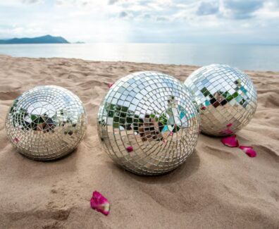 disco-ball-sand-view-from-beach-party_397170-1660