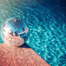 Party rave event disco ball at swimming pool