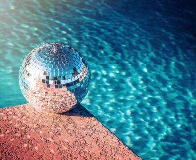 Party rave event disco ball at swimming pool
