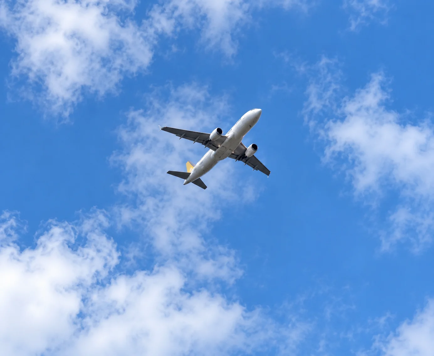 airliner_soaring_through_blue_skies