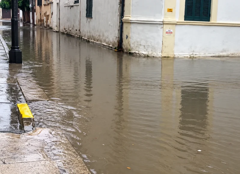 rain_flooded_shuttered_street